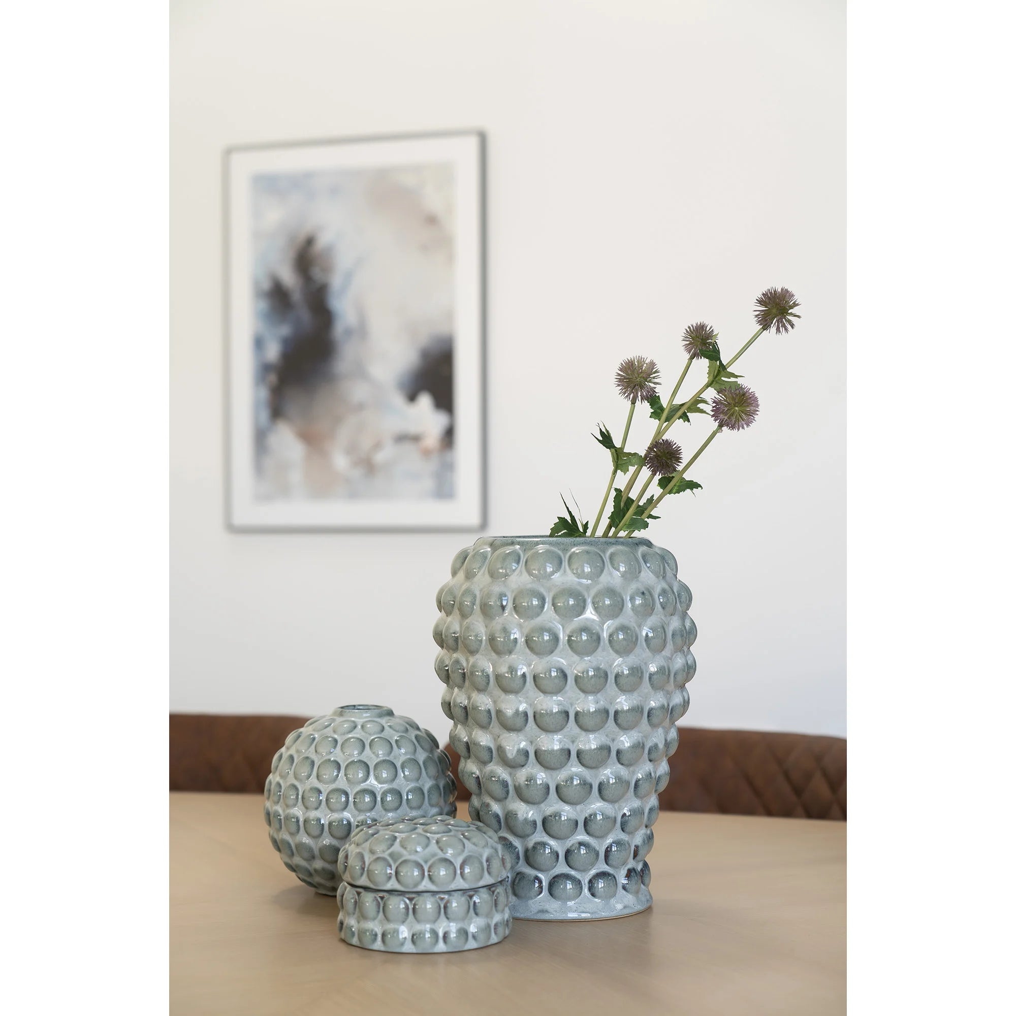 Rund vas i blå keramik